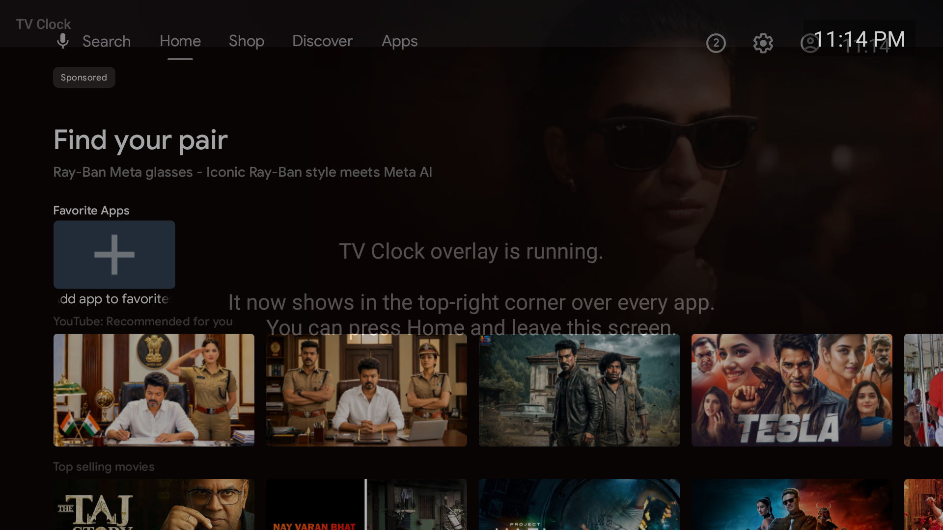 TV Clock overlay showing 11:14 PM over the Google TV home screen